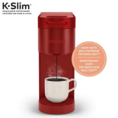 Red Keurig K-Slim single-serve coffee maker with cup.